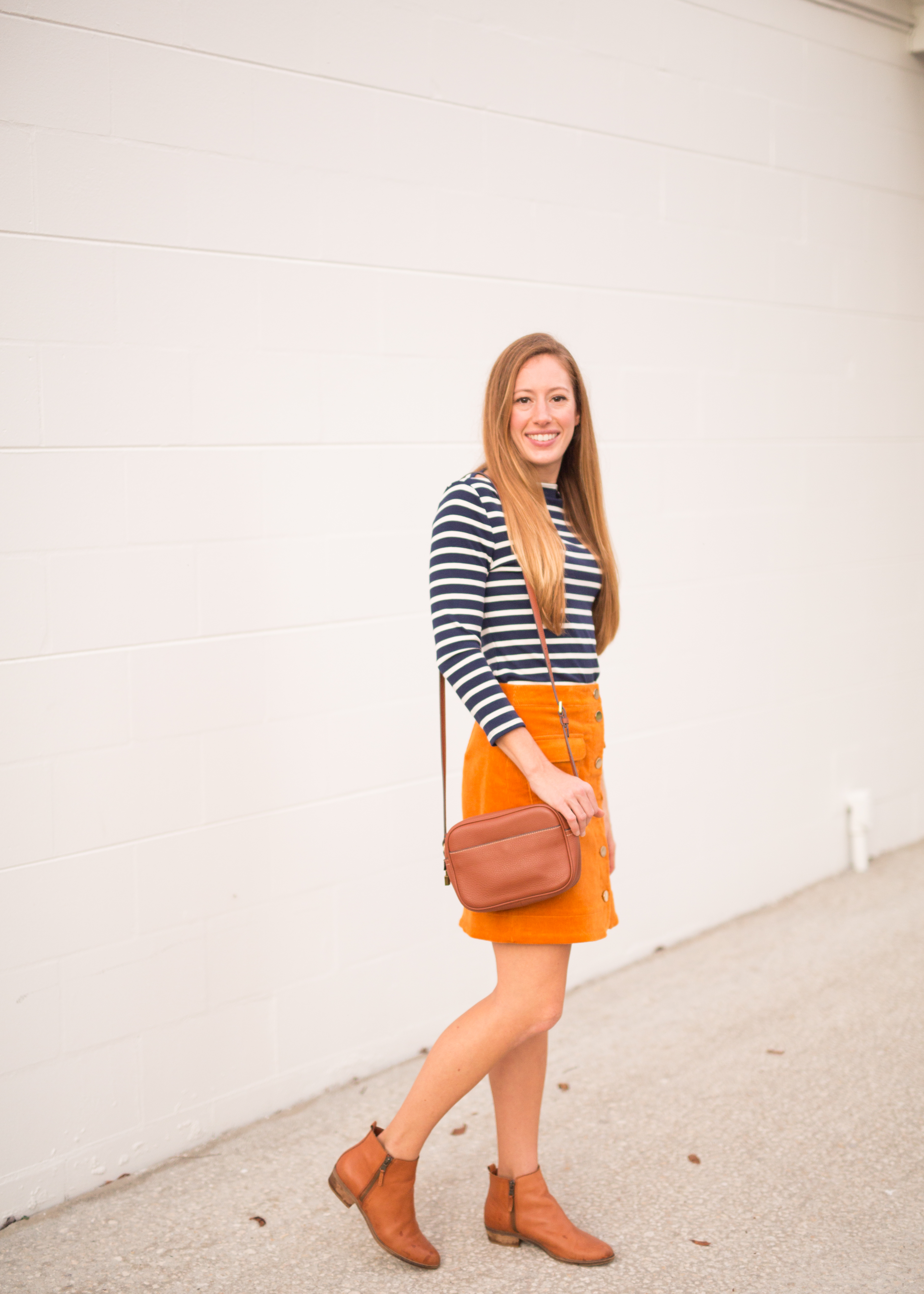 wearing booties with a dress