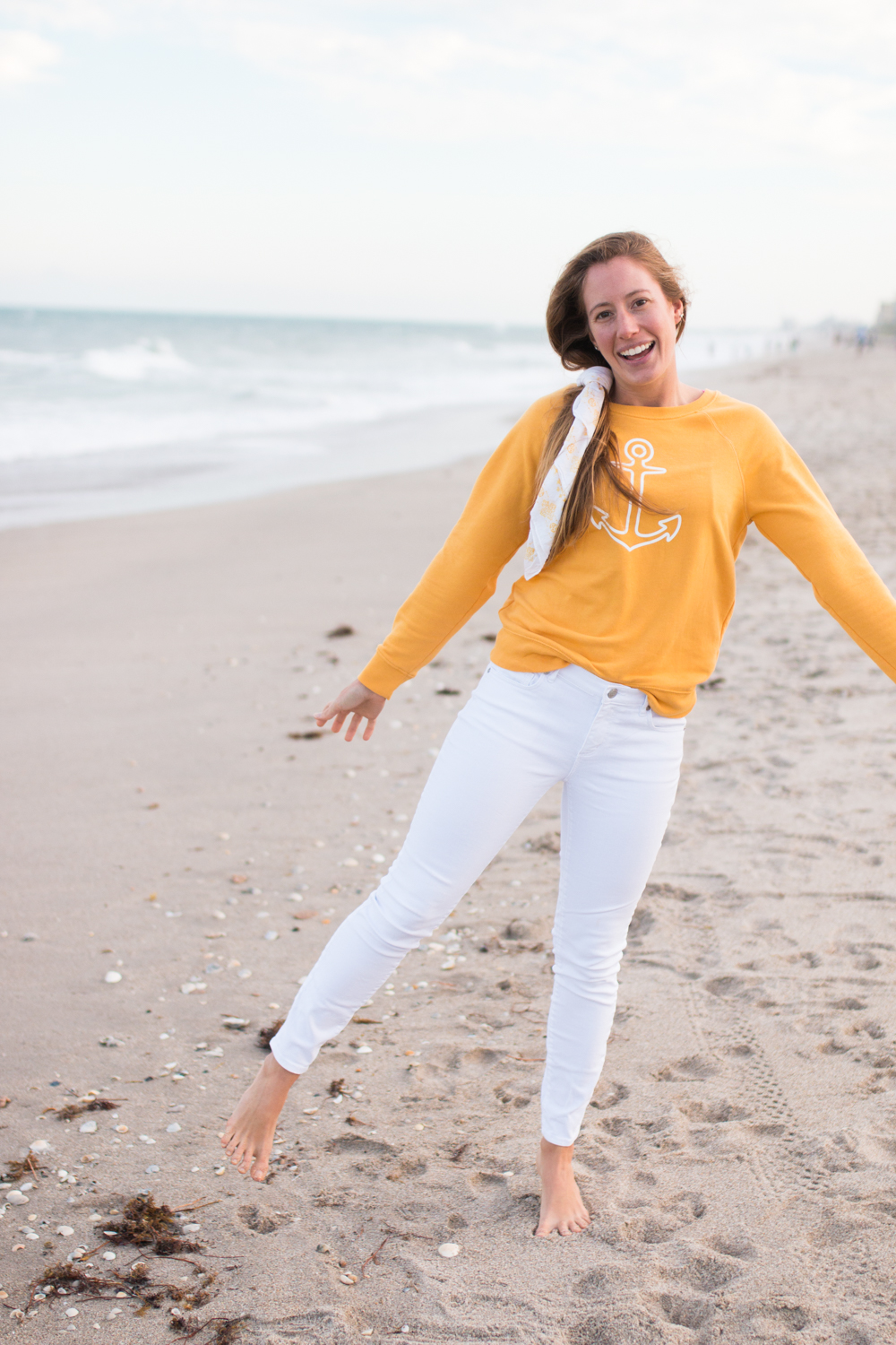 Colorful Graphic Sweatshirt to Wear at the Beach | Old Navy Anchor Graphic Sweatshirt | Casual and Comfy Winter Outfit | AE White Skinny Jeans - More on www.sunshinestyleblog.com