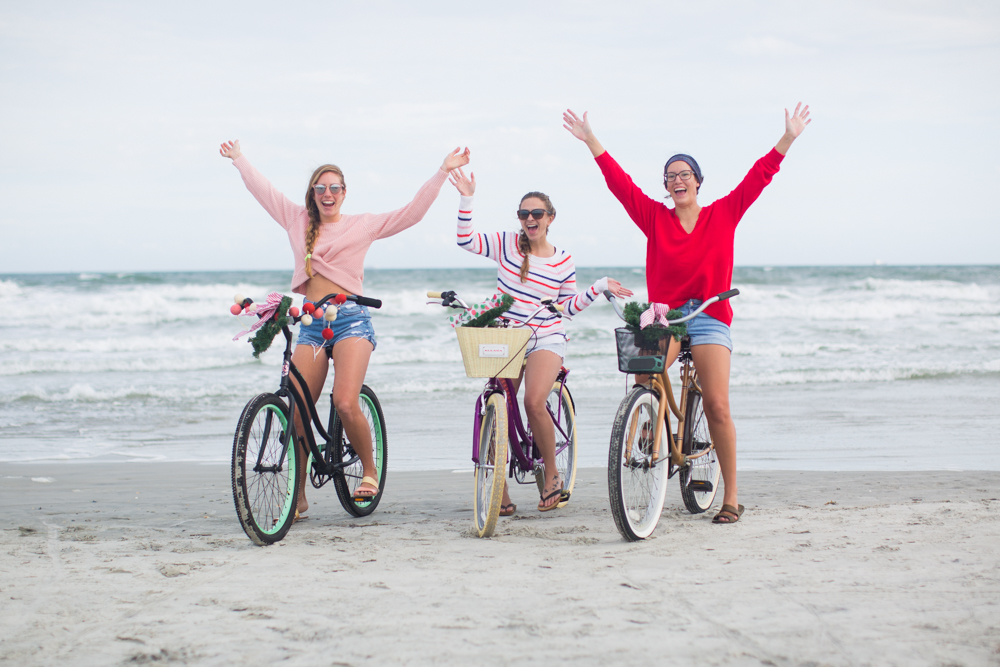 Sweaters to Wear During the Holiday Season | Beach Bike Ride | Winter Outfit Ideas | Christmas in Florida | Beach Bike Ride | Cropped Pink Sweater | Twisted Back Sweater | Red Knit Sweater | Striped Sweater