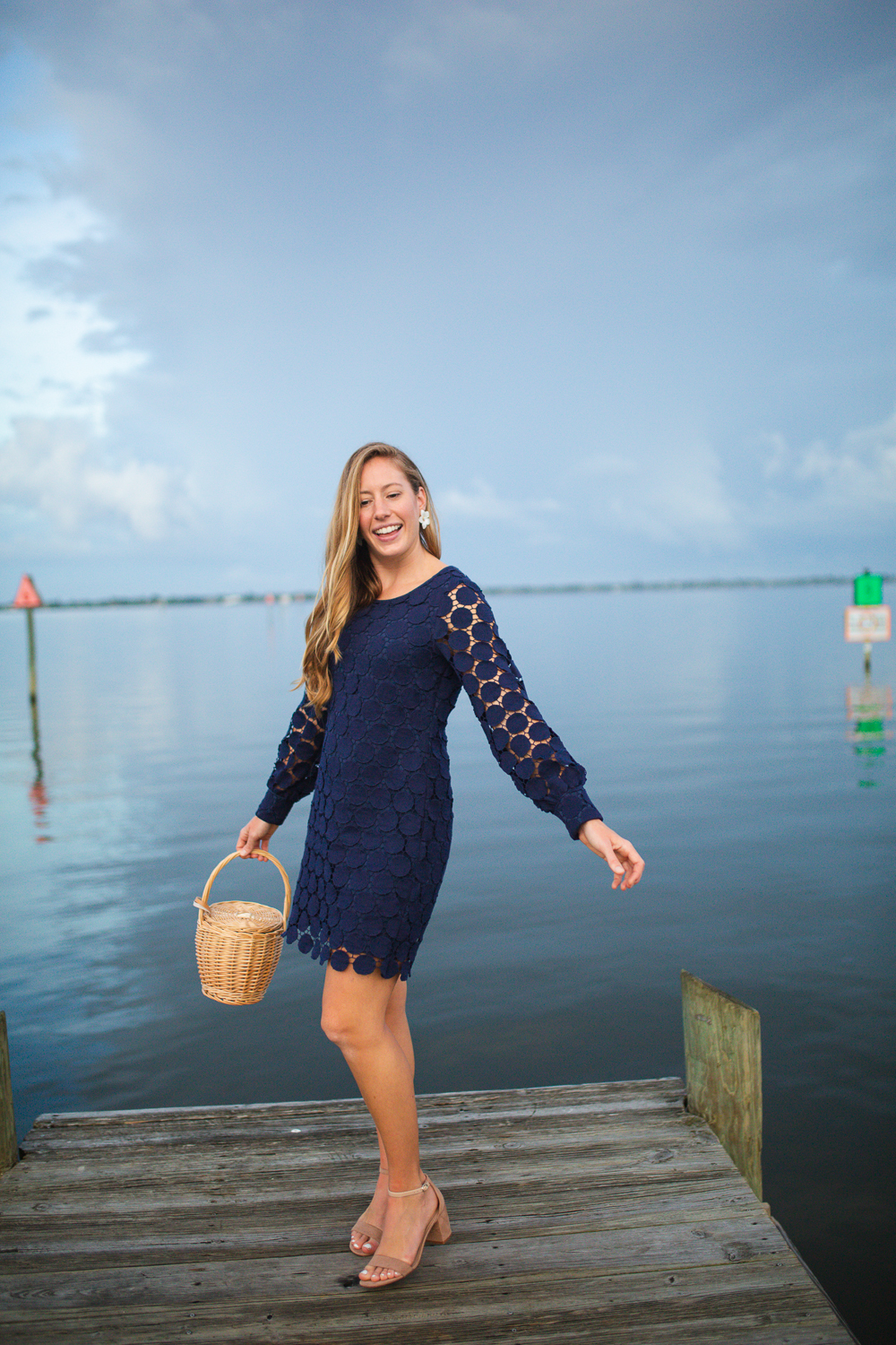 woman wearing blue lace dress