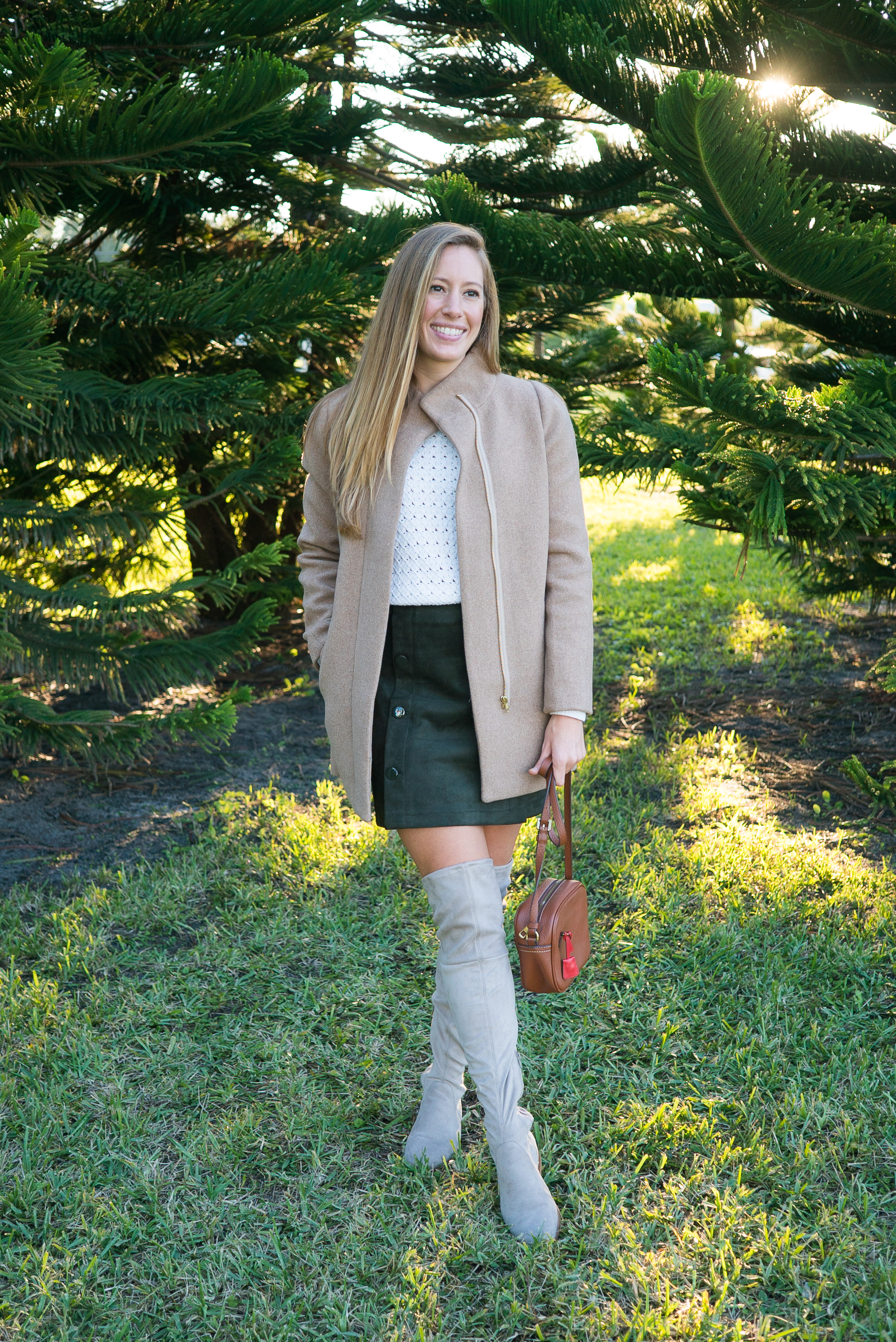 woman in white top and black skirt for Cyber Monday Sales