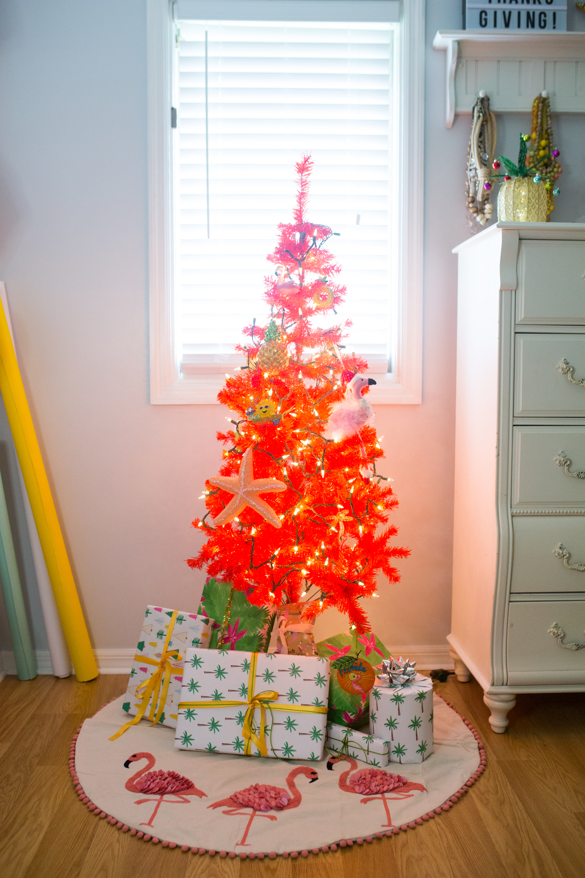 pink tree Non-Traditional Tropical Christmas Decoration with gifts 