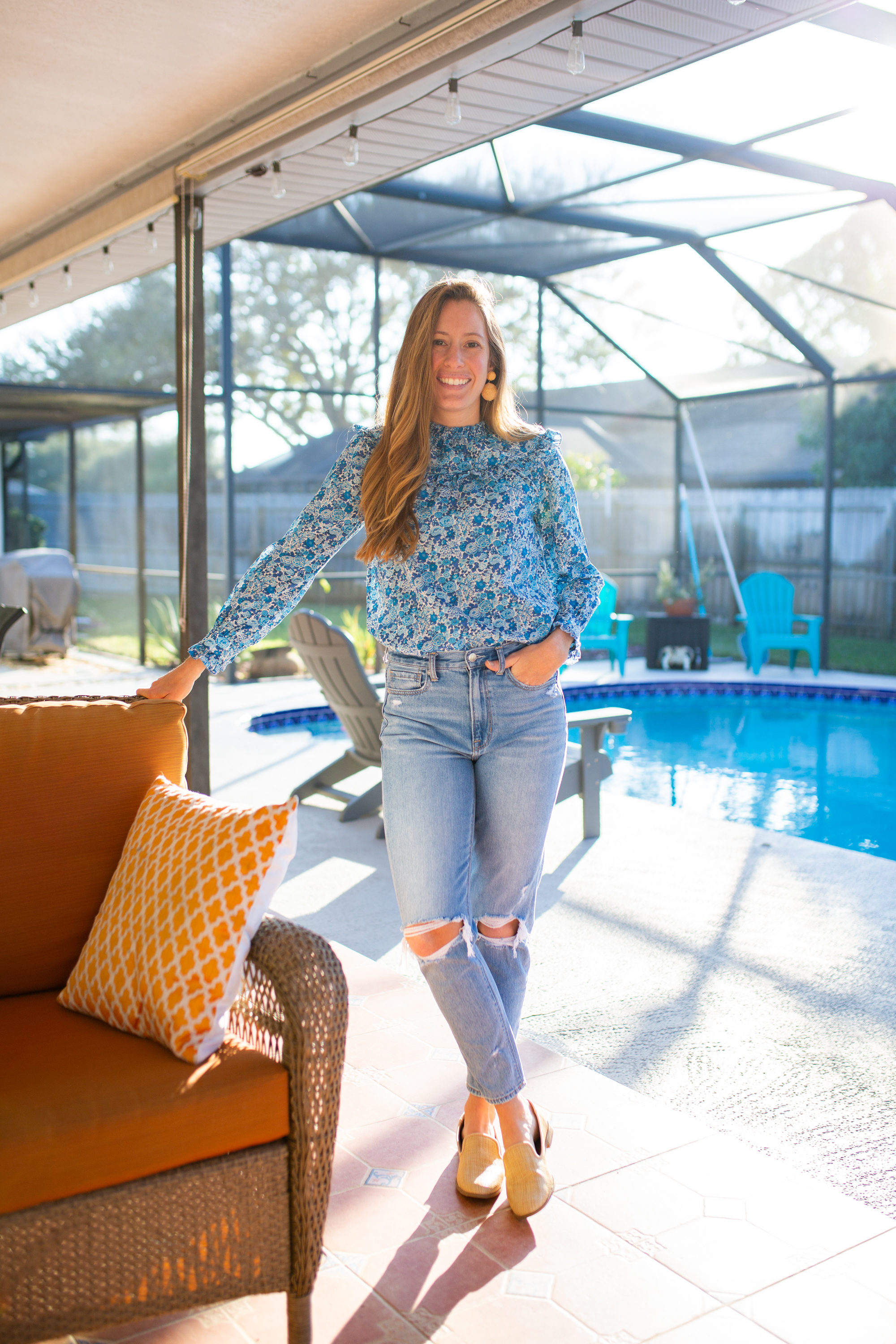 woman wearing J.Crew Liberty Print and tattered jeans 