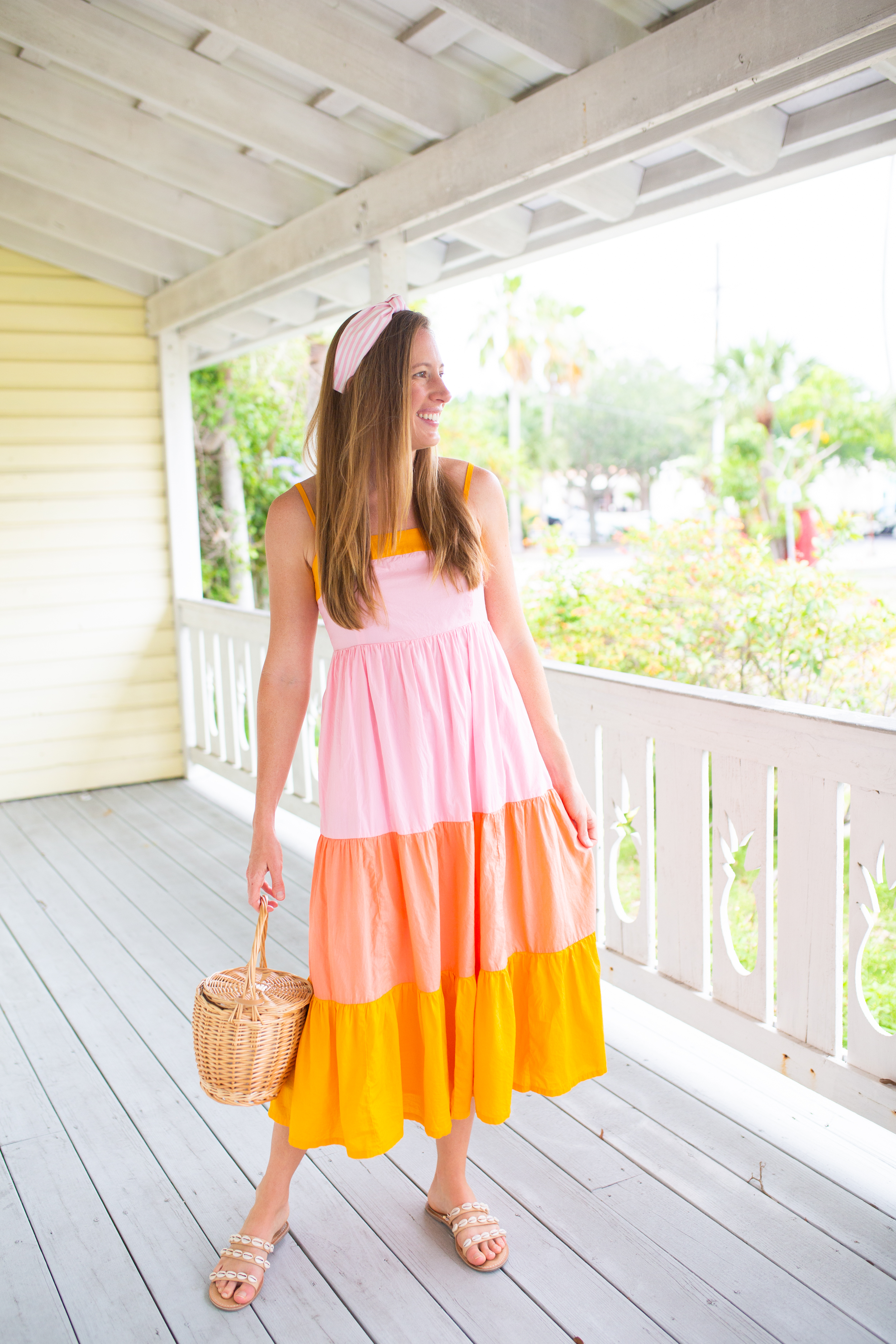woman wearing pastel dress and Sunshine Style Co. Summer colelction
