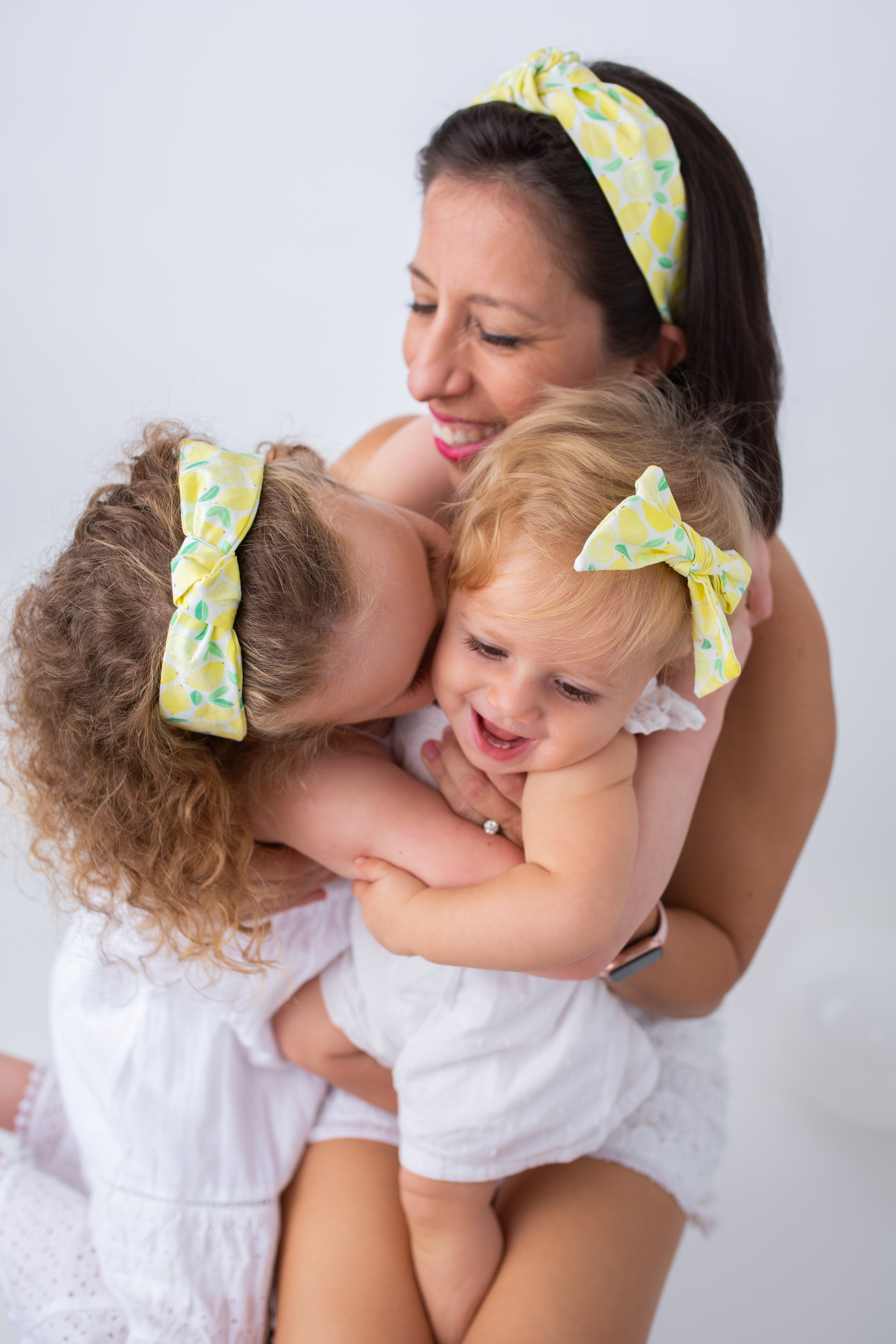 mom and kids wearing Sunshine Style Headbands