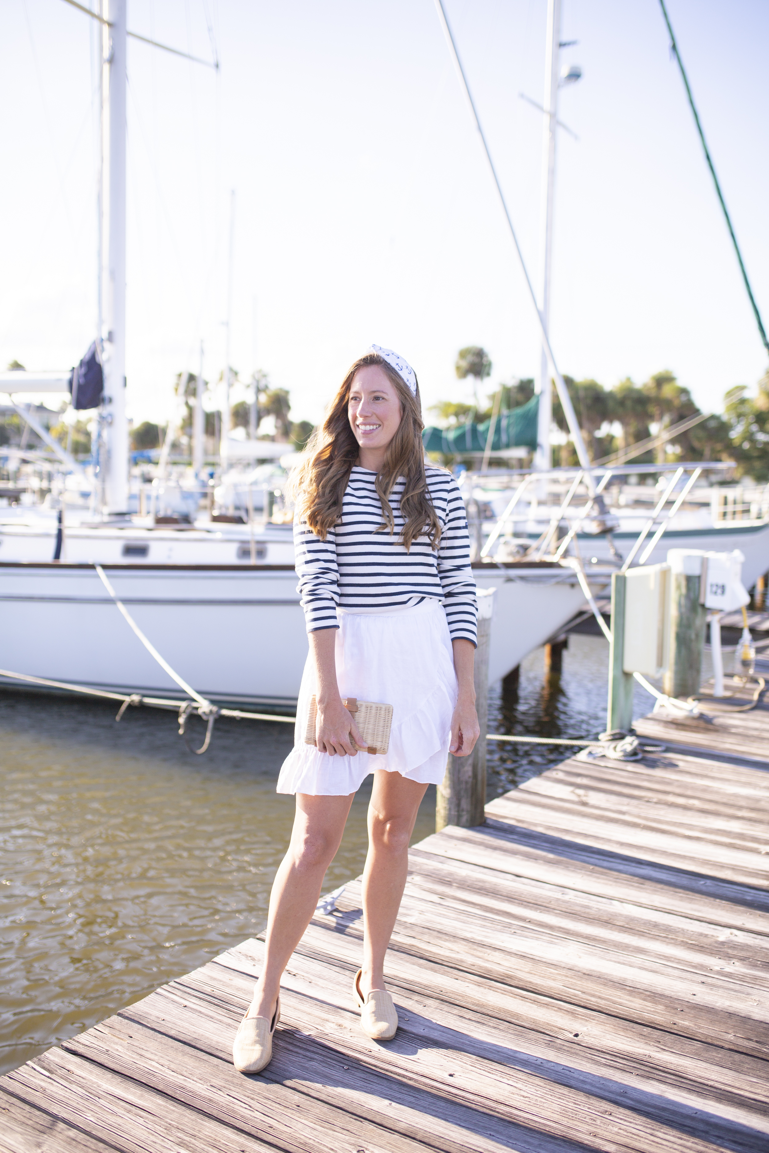 woman in striped Saint James Breton and white skirt