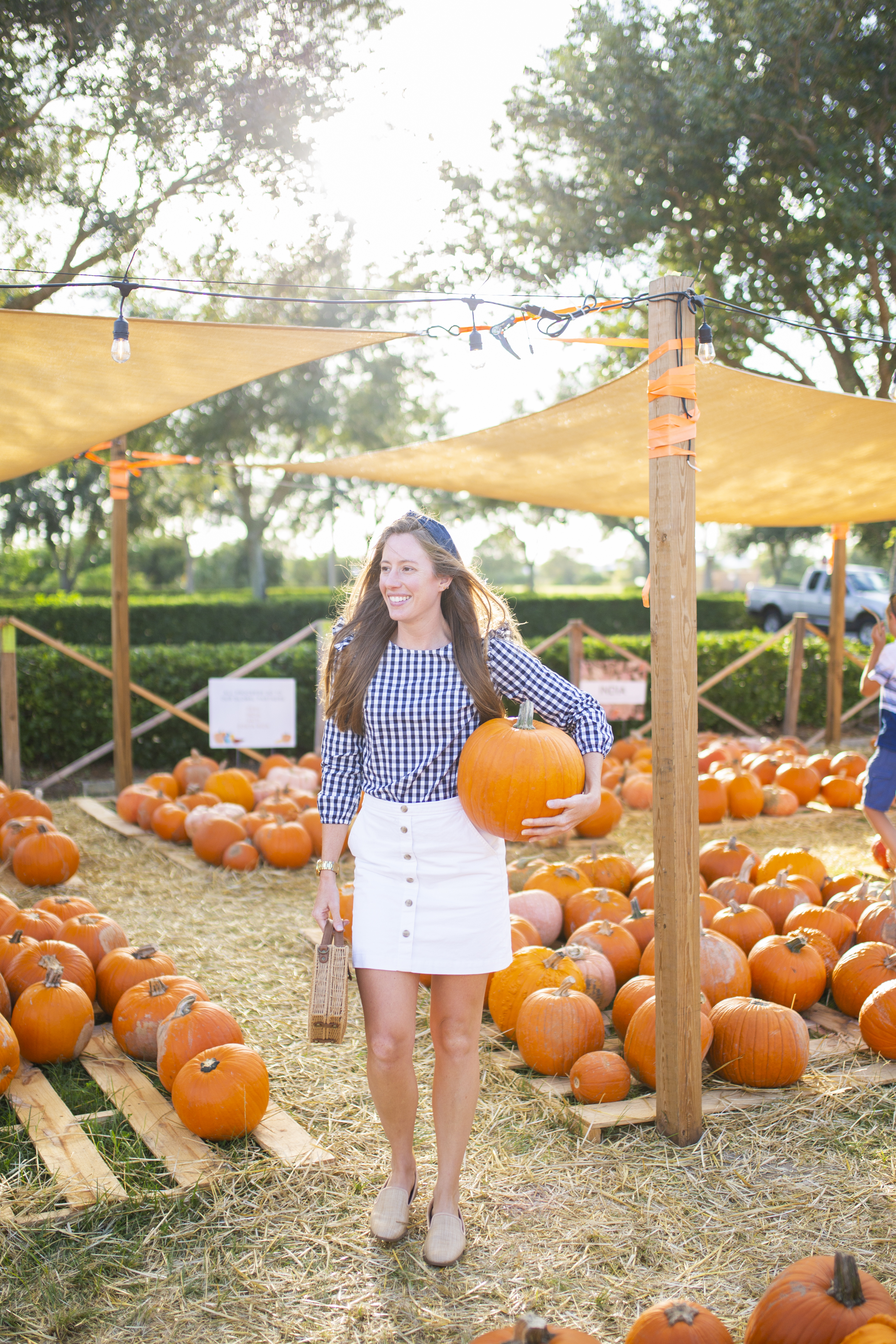 woman in a pumpkin sale wearing Fall Outfit with J.Crew Factory
