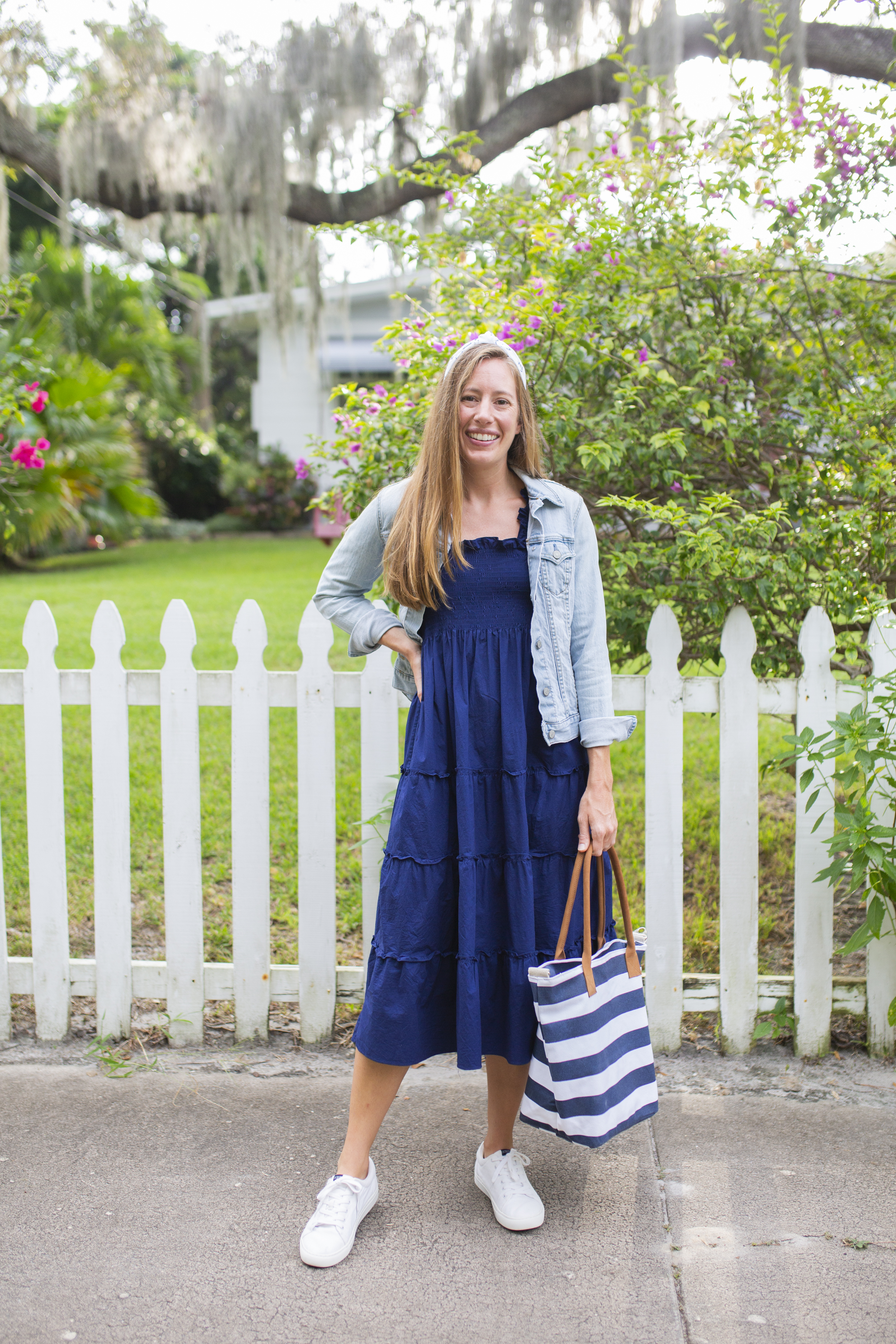 woman showing how to style a Style a Nap Dress with denim jacket 
