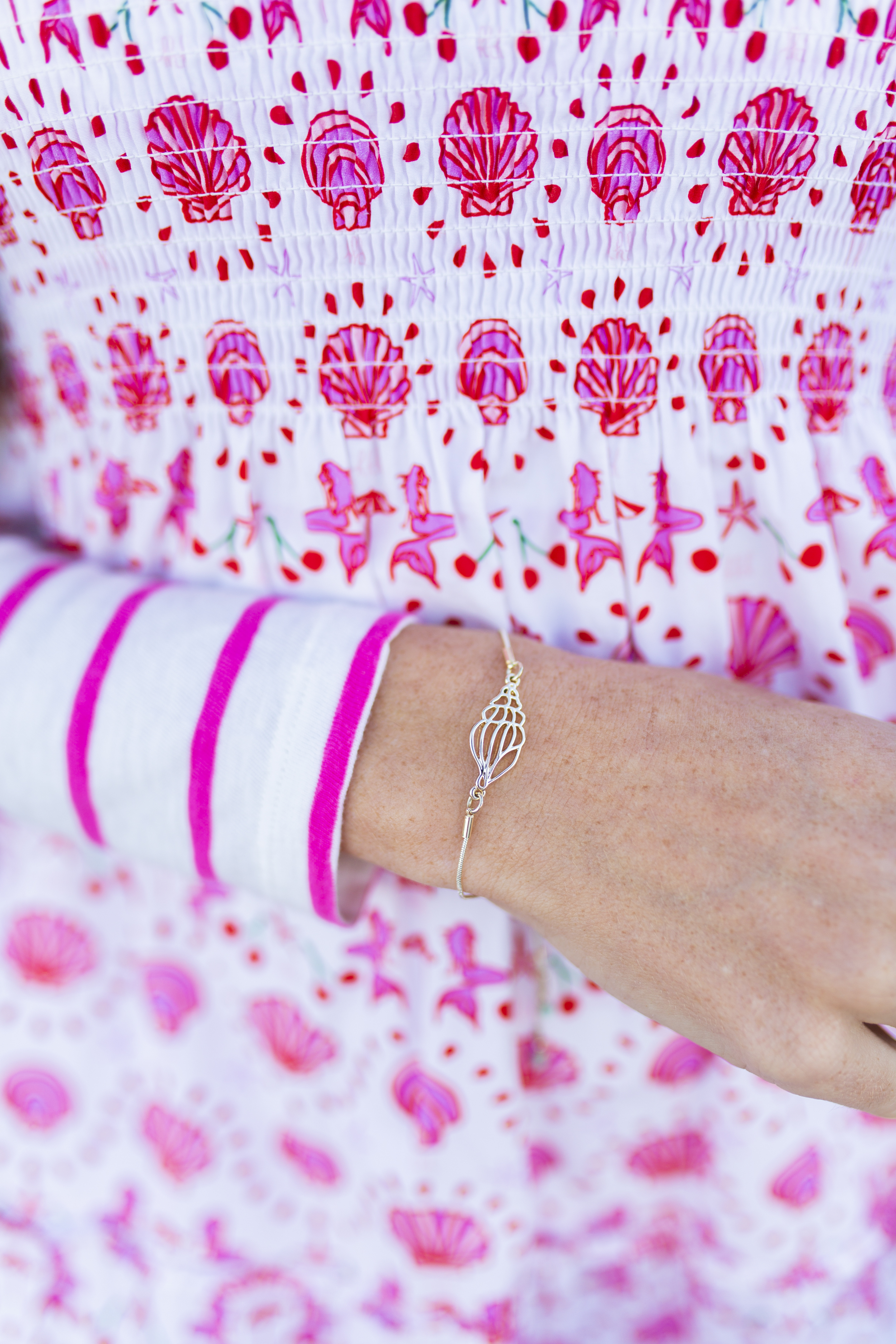 woman showing bracelet and Styling a Nap Dress